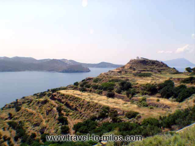 PLAKA - A cliff with a windmill